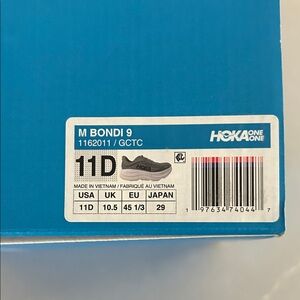 Hoka Bondi 9 Men's Shoes in Gray.
